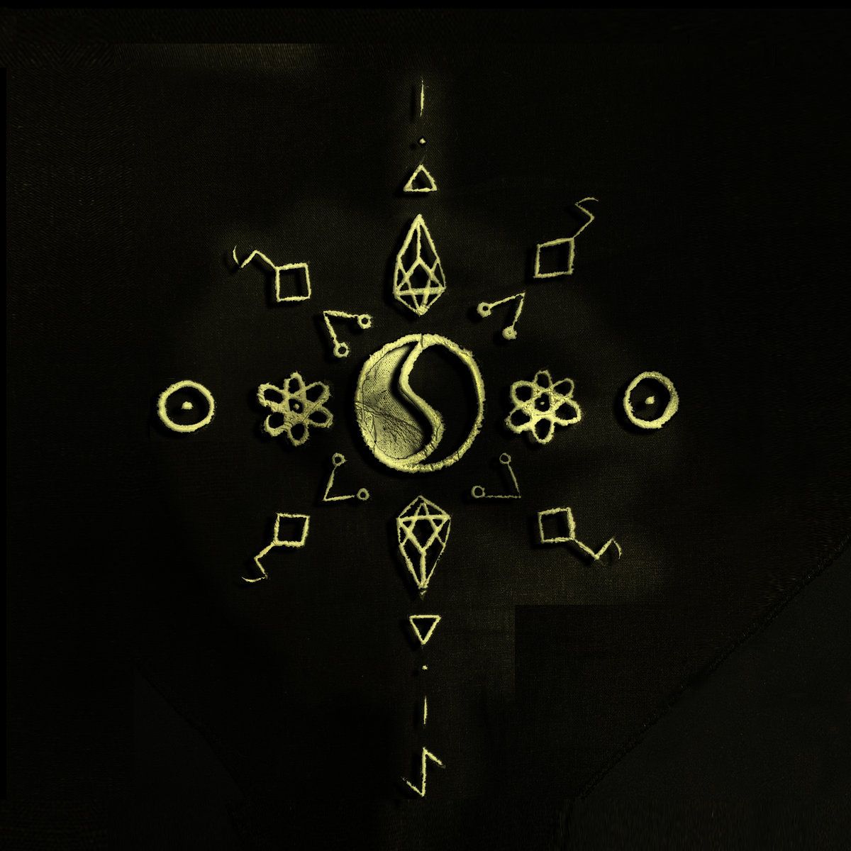 Yin cover: a gold yin-yang glyph ringed by ancient symbols on black, by Majeyec